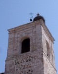 Cigüeña en la torre de la iglesia